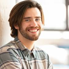 Zachary_Amos seen in grey with brown color check pattern shirt